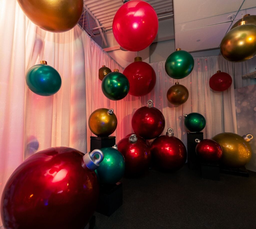 Giant Christmas ornaments photo set at ChristmasLand