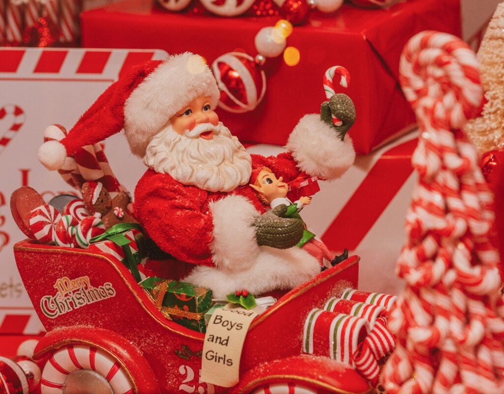 Santa in a candy cane sleigh figurine at ChristmasLand